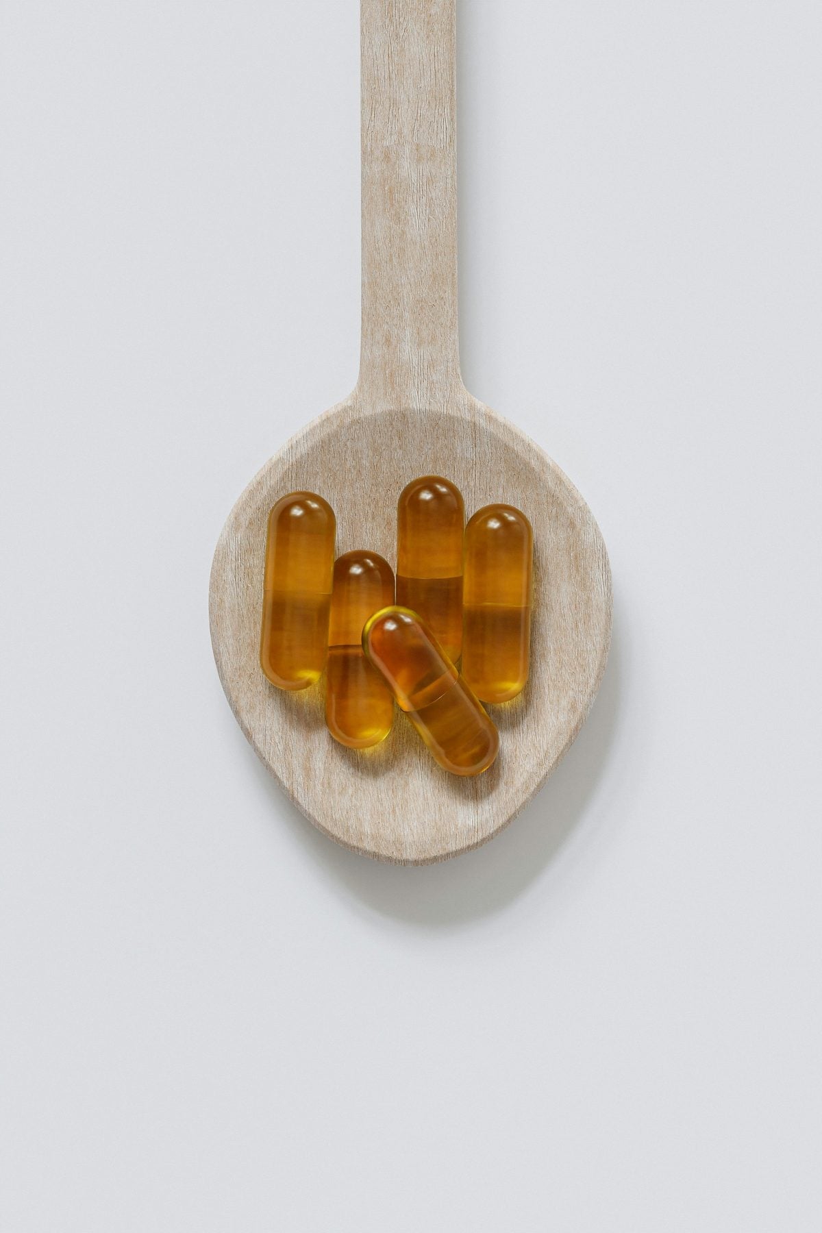 Capsules on a spoon
